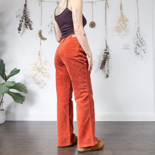 Orange velvet trousers - size M/L