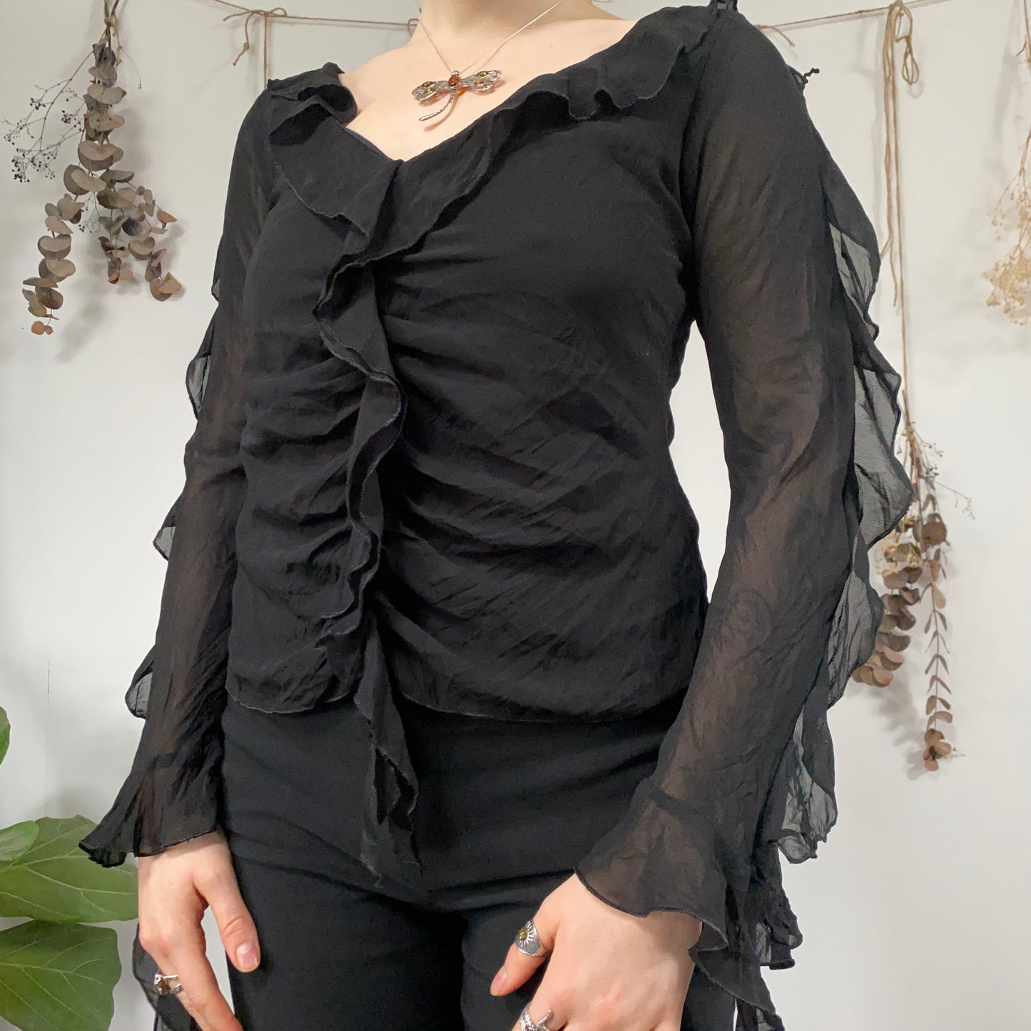 Black ruffle blouse - size M