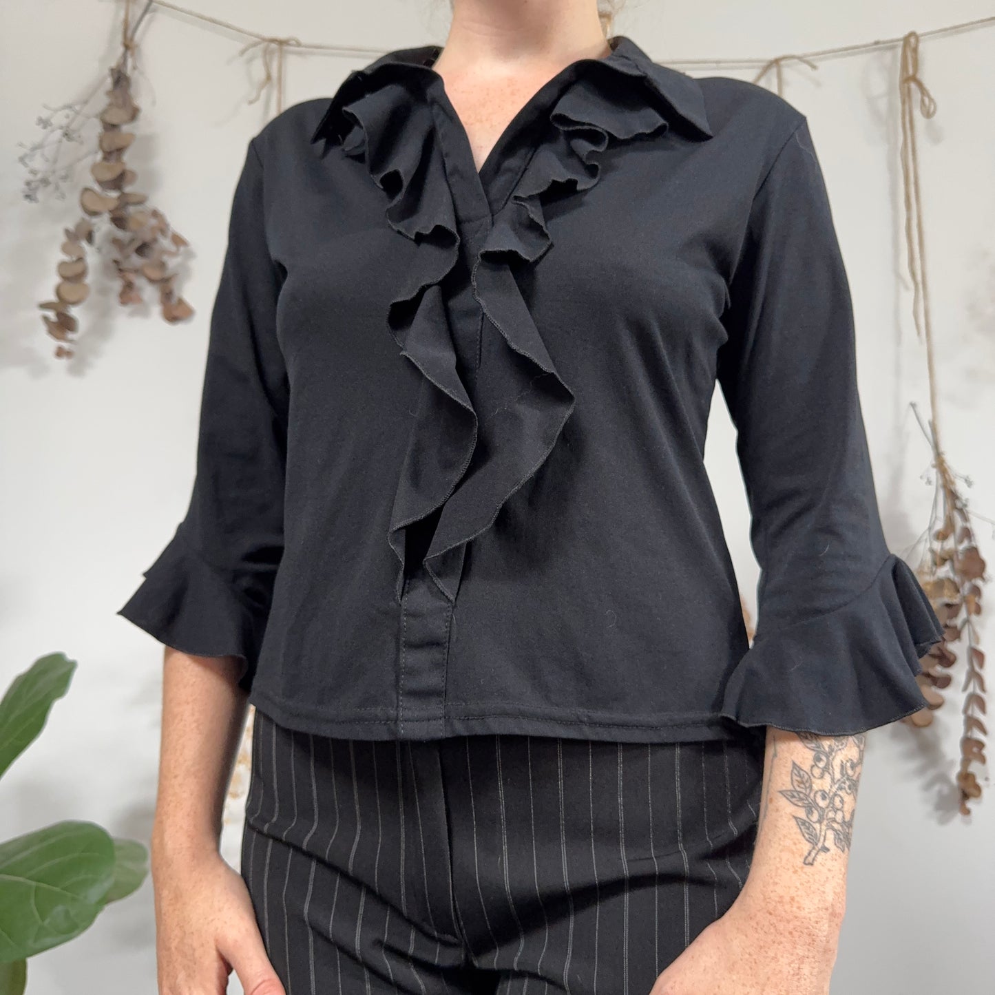 Black ruffle blouse - size L
